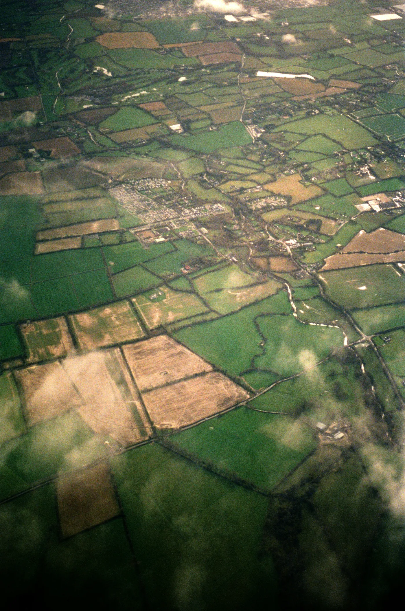 Aerial view of patchwork farmland across the South East